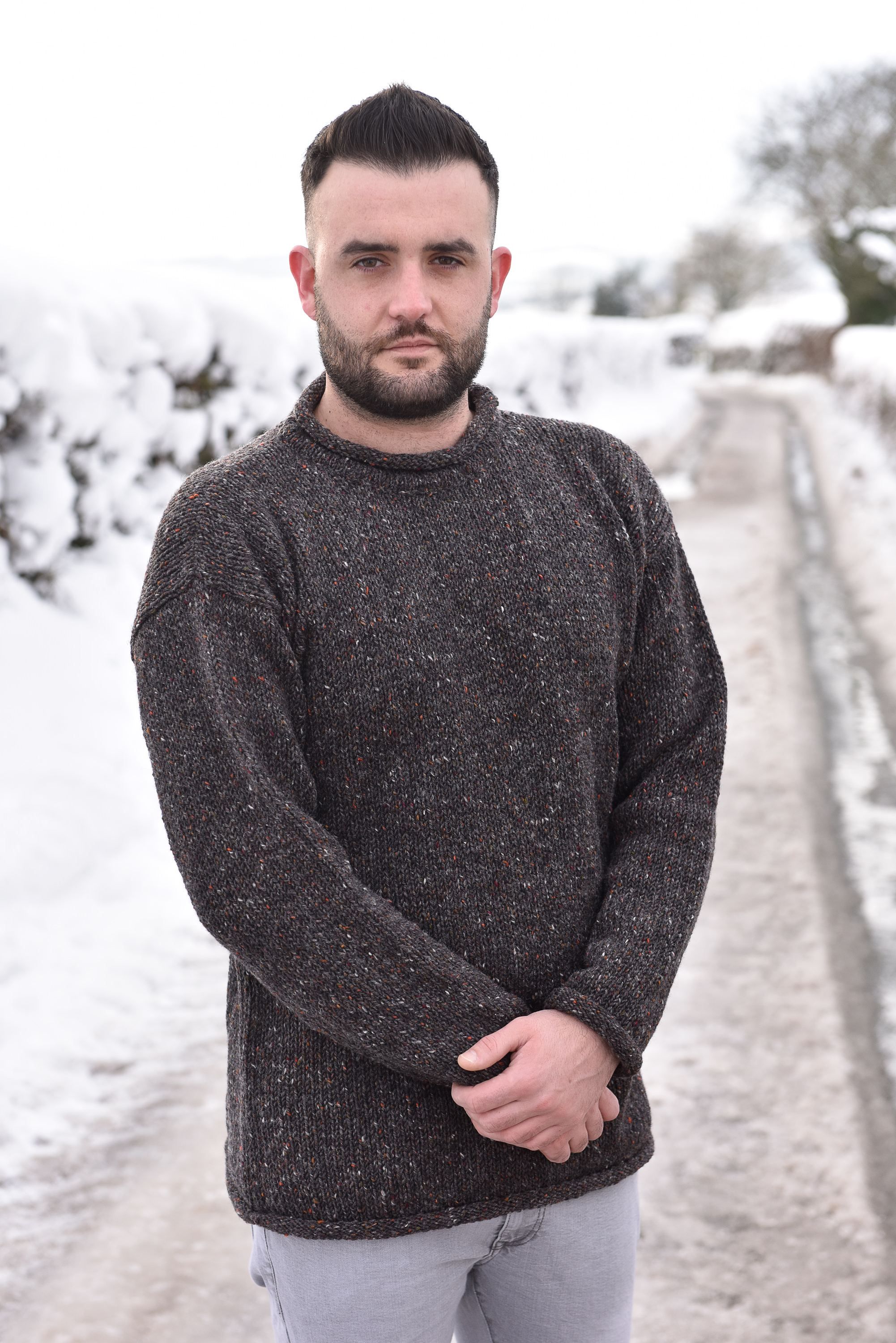 A beautiful dark grey Donegal tweed wool roll neck sweater from