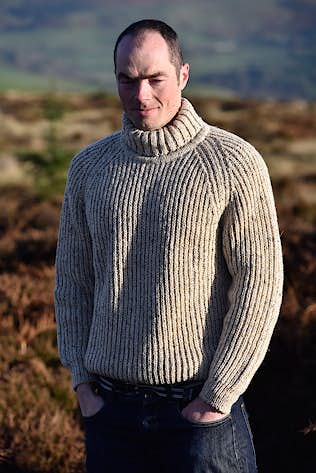 Men's Irish Donegal tweed wool polo neck sweater in a fisherman's rib  stitch.
